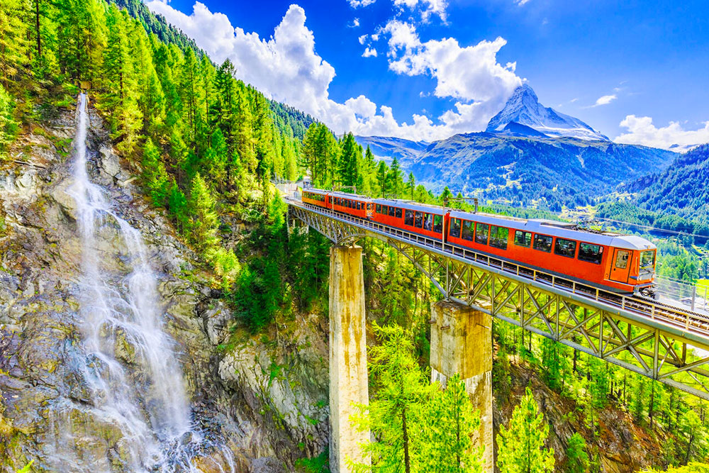 Gornergrat Tourist Train With Waterfall, Bridge and Matterhorn, Zermatt, Switzerland - Cheapest Time
