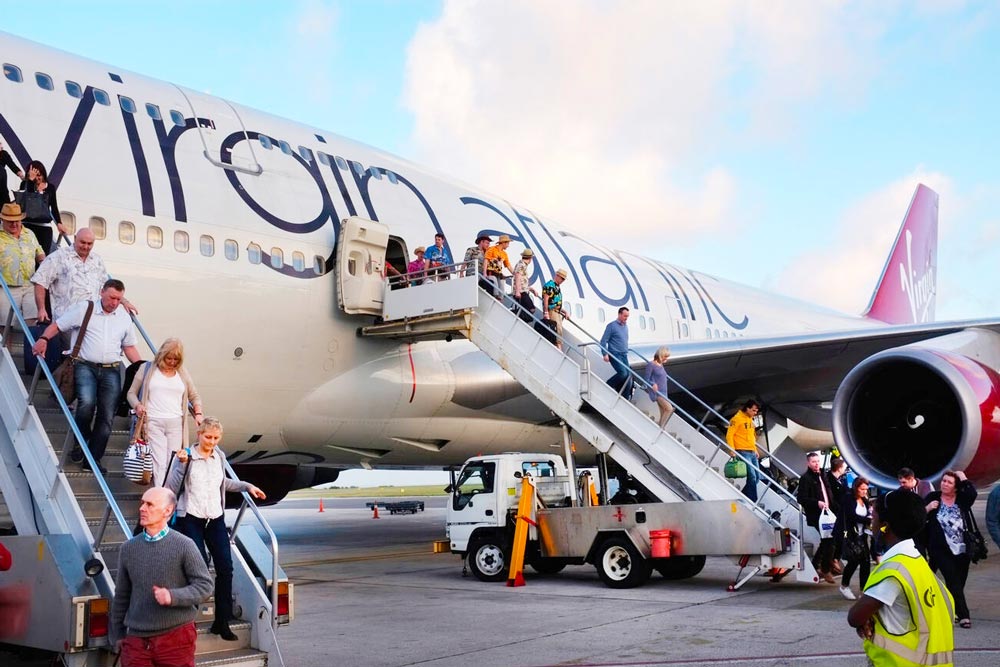 Passengers Disembarking at Grantley Adams International Airport, Barbados - Cheapest Time